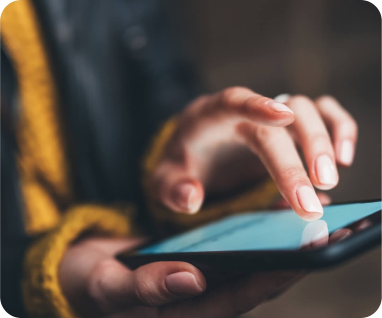 Closeup of a person scrolling a smartphone