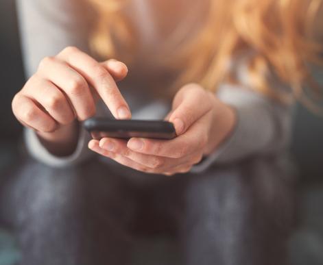 Woman's hand with phone